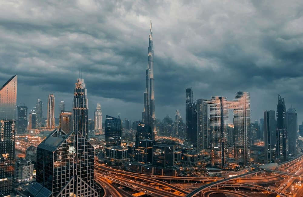 Downtown Dubai skyline under storm clouds
